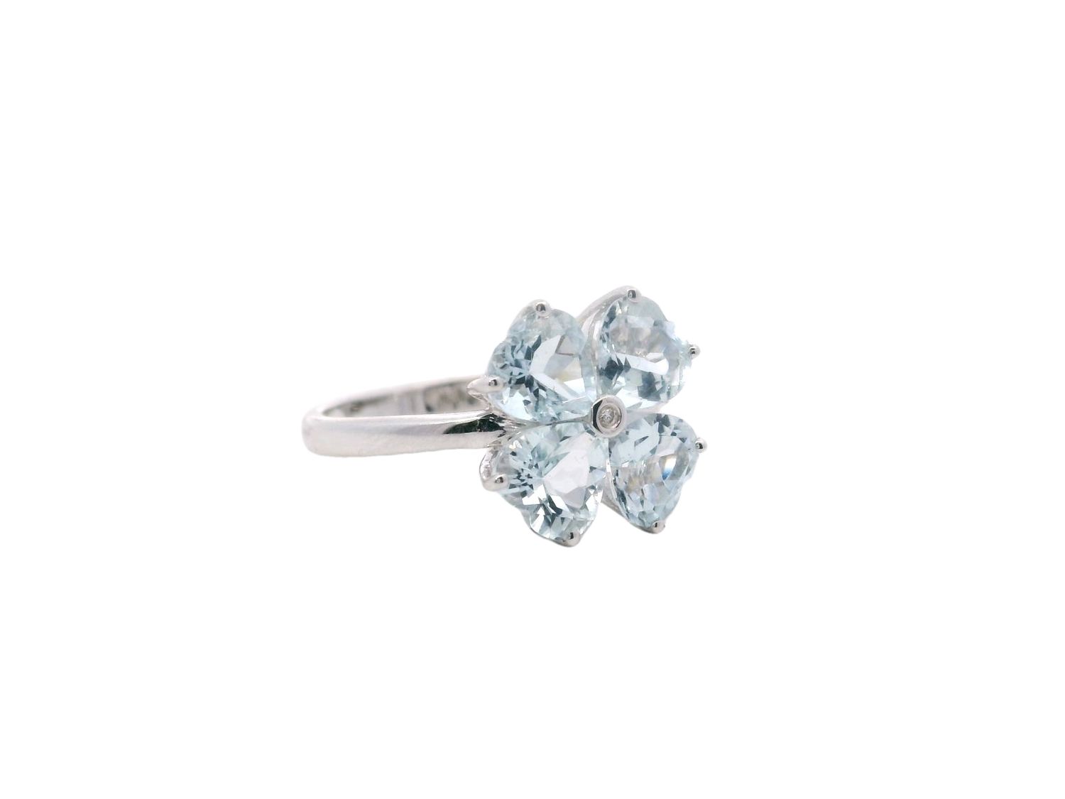 ANILLO ORO BLNCO  FLOR AGUAMARINA Y DIAMANTES 18K