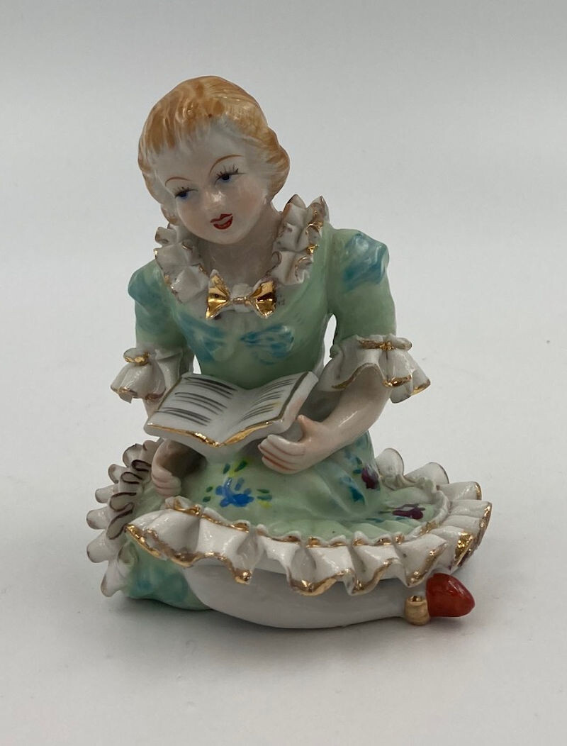 Vintage Wales Porcelain Victorian Green Color Figurine. Highly detailed Girl with a Book in Sculptured Ruffled Period Clothes.