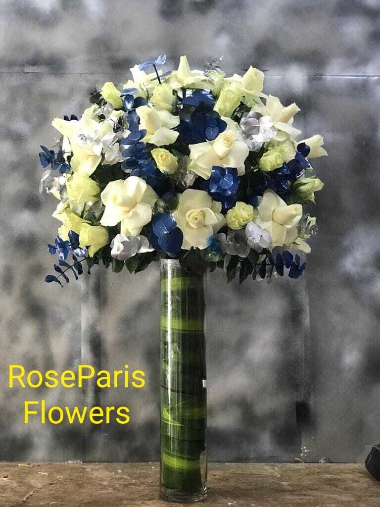 White And Blue Flowers In Vase