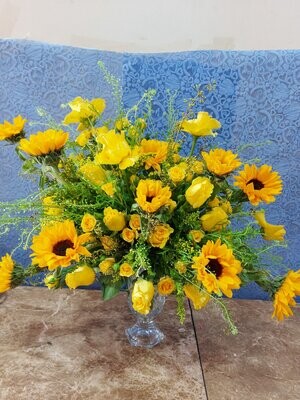 Bunch Of Yellow Glaring Flowers In vase