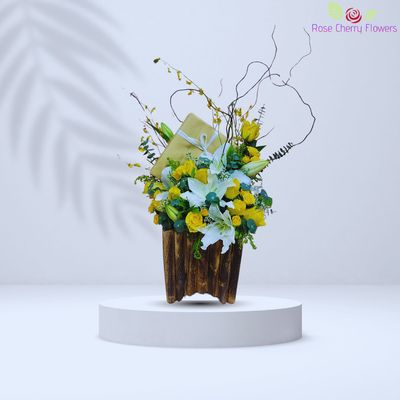 Flowers In Wood Basket
