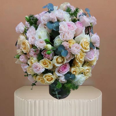 Mixed Baby Roses In Vase