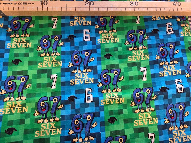 Sommersweat Six Seven blau grün 45cm x 180cm breit 