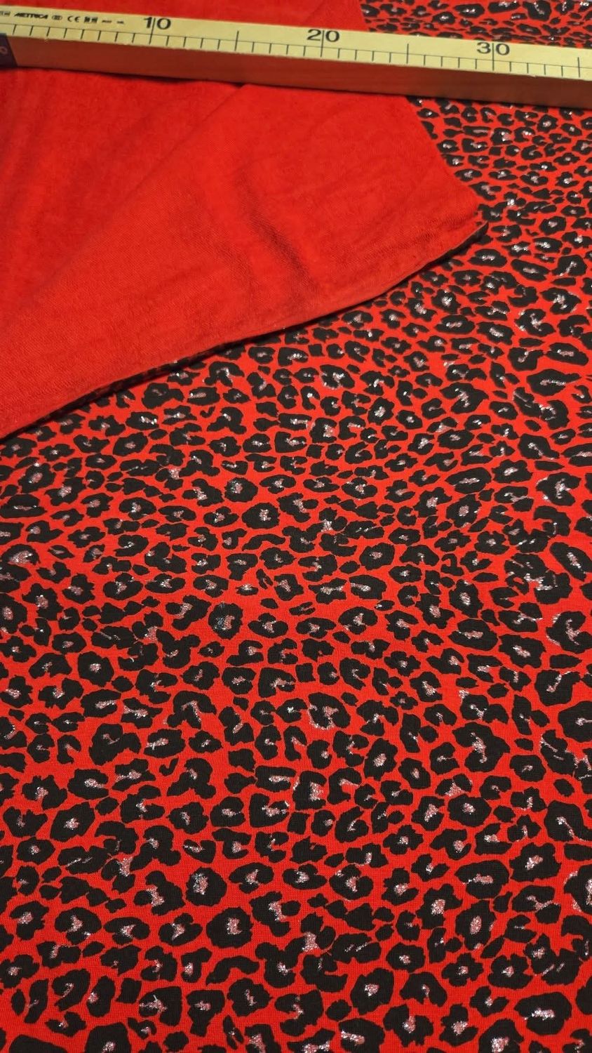 Sommersweat Leo Animal Print mit Glitzer rot 50cm x 160cm 