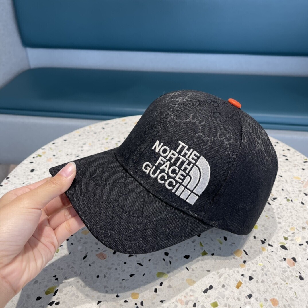 Cappello GG x TNF