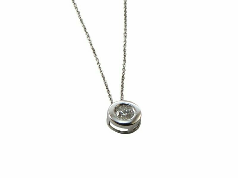 Colgante oro blanco con brillante