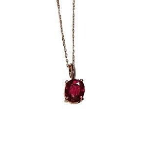 Colgante oro rosa y rubí oval en garra