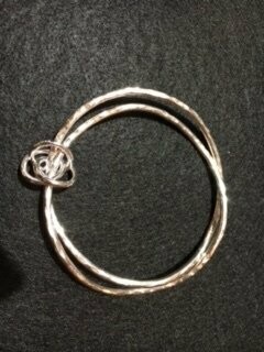 double bangle with interlinked rings