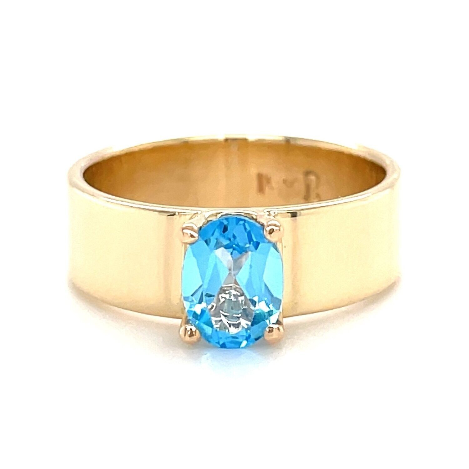 Oval Blue Topaz Ring in 14k Yellow Gold