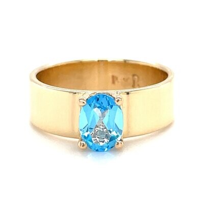 Oval Blue Topaz Ring in 14k Yellow Gold