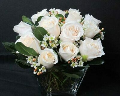 White Roses and Waxflower Arranged in a Vase