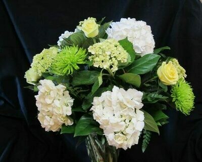 White, Cream, and Green Flowers Arranged in a Vase