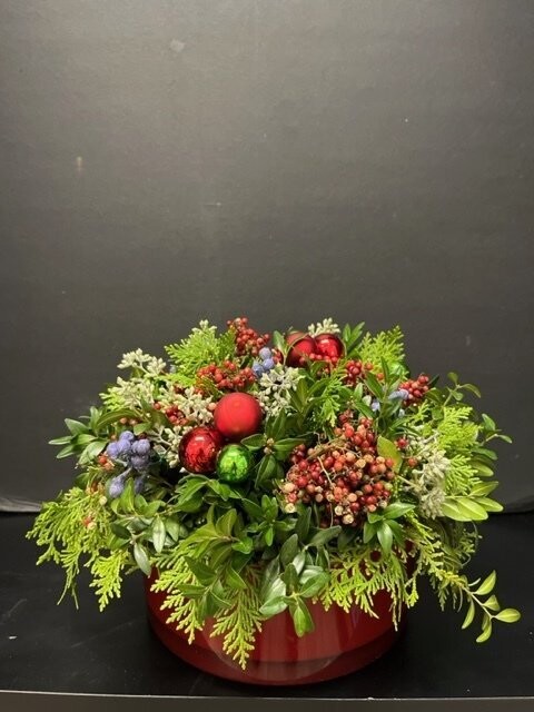 Long lasting Berry Arrangement in a round red polish glass bowl