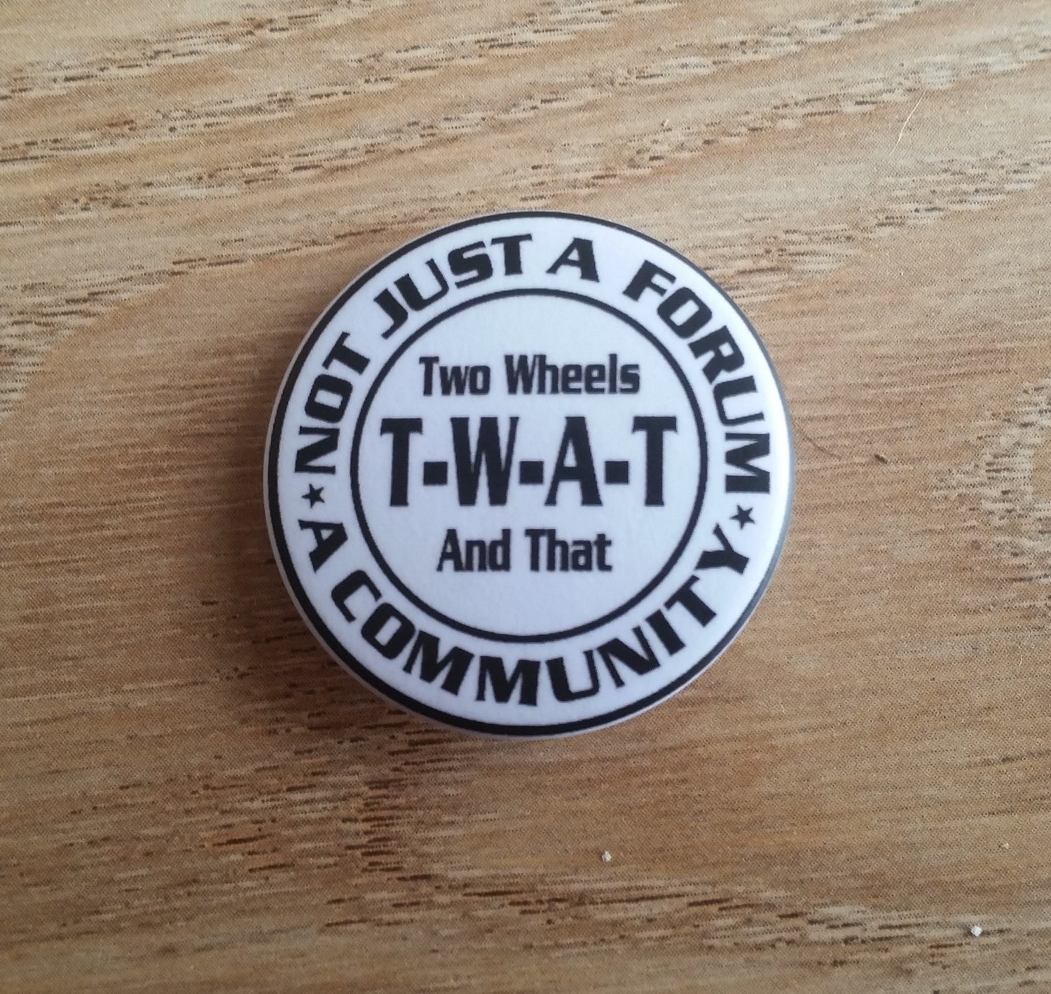 T-W-A-T Lapel Badge