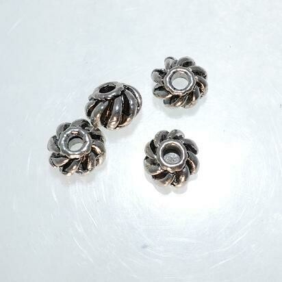 Metallperlen 5x7mm / 12 Stück