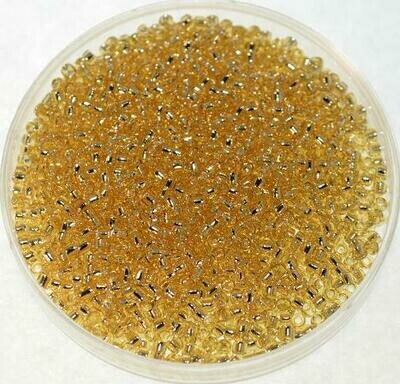 Toho 15/0 Silverlined gold / 10 g