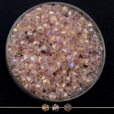 Facettierte Glasperlen in Roségold, Bicone-Schliff, 3 mm, mit AB-Schimmer auf schwarzem Hintergrund
