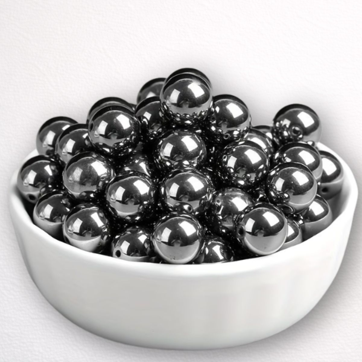 Hämatit-Perle 12mm – Glänzendes Anthrazit | Schmuck selber machen Runde Hämatit-Perlen mit glänzendem Anthrazit-Finish, 12 mm – perfekt für DIY-Schmuckprojekte