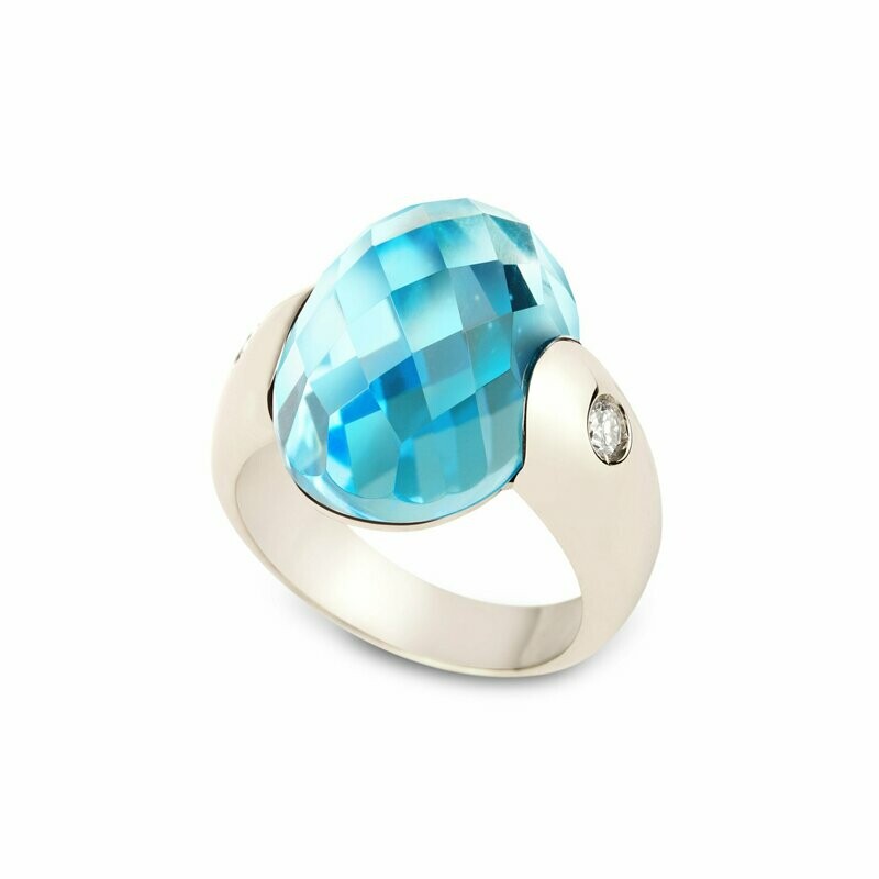 White gold with light blue topaz