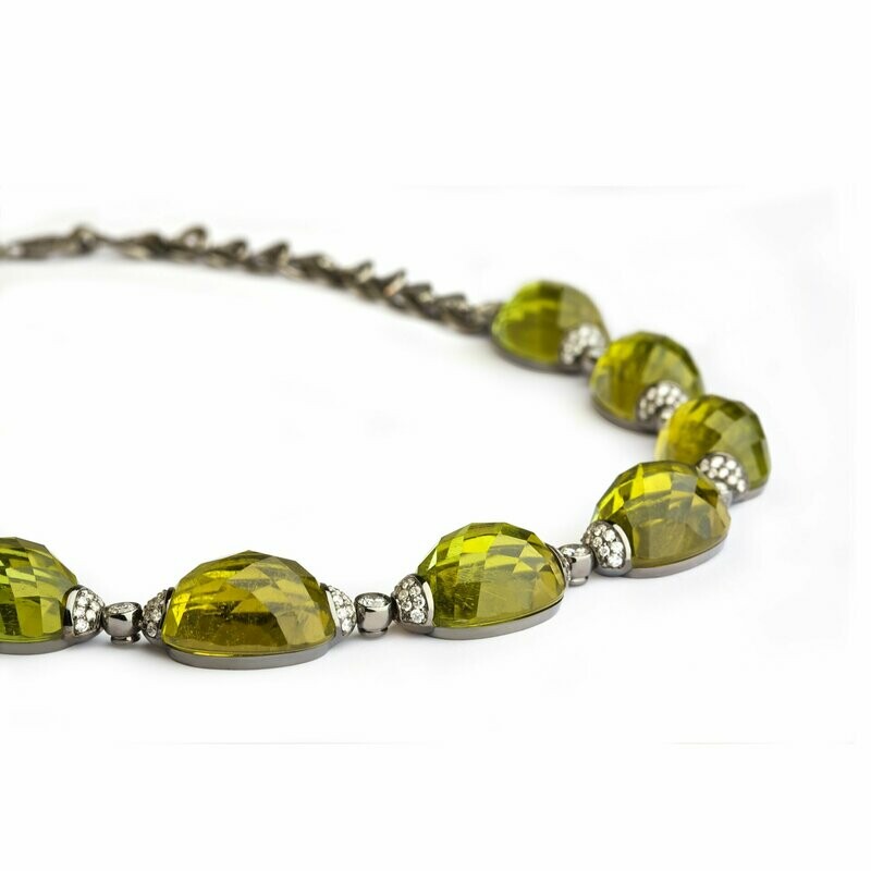 White gold diamond pave with light green tourmaline