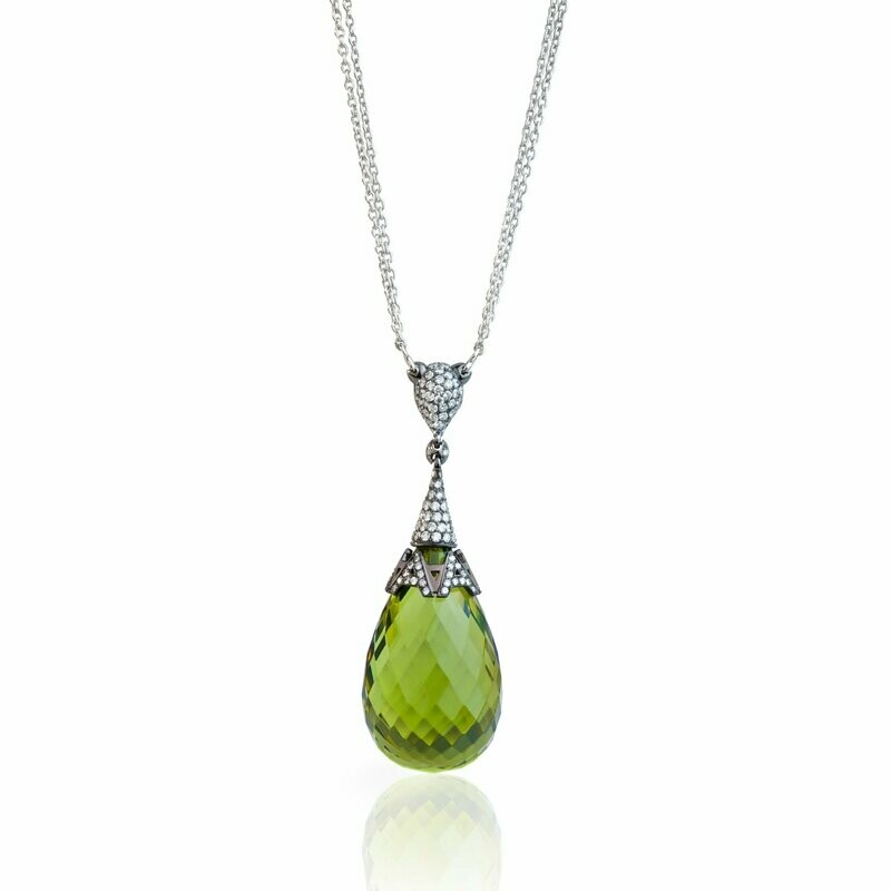 White gold with green amber and diamonds