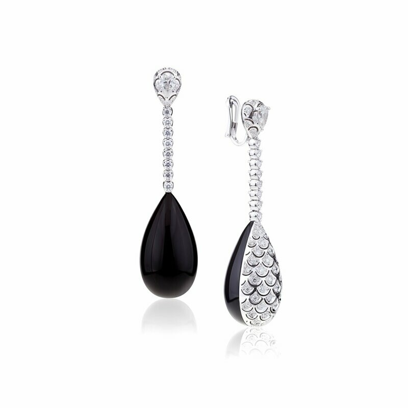 White gold with diamonds and black onyx