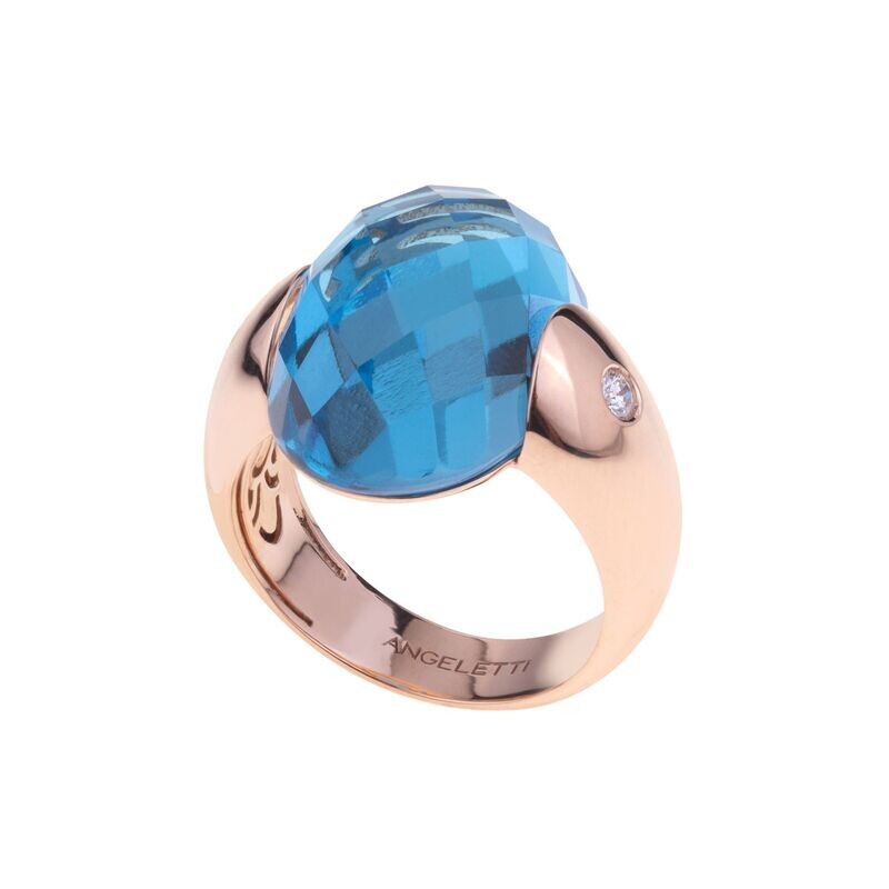 Rose gold with light blue topaz