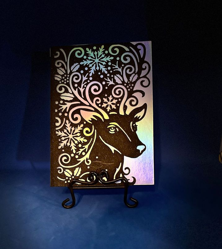 "Black Reindeer with Holograpic background"
