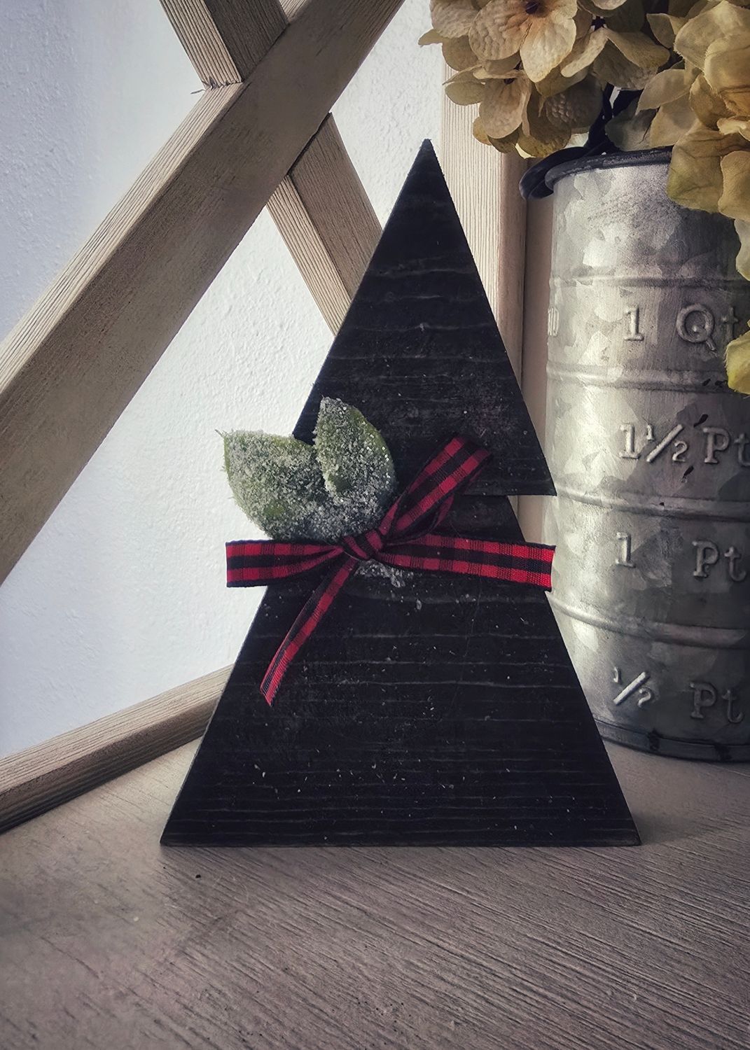 Small Dark Tree Red Bow