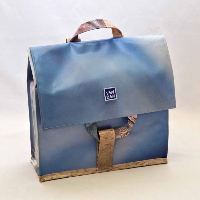 Rugtas blauw zand