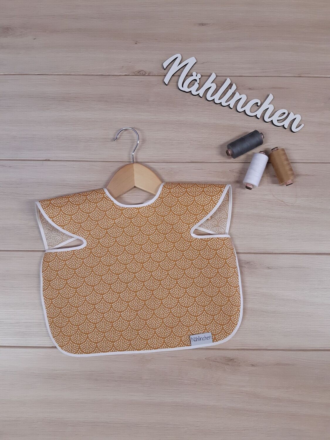 abwaschbares Lätzchen Bögen senfgelb