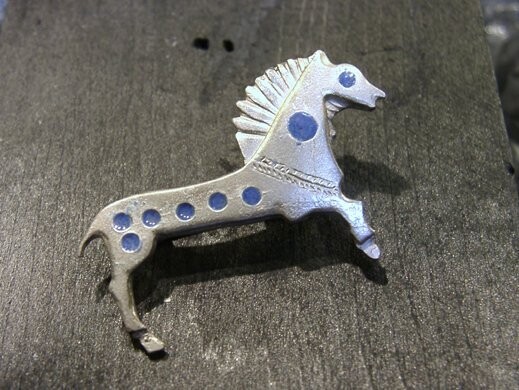 roman enamelled horse brooch