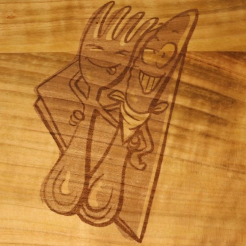 Holzschneidebrett aus Kirschholz mit eingebranntem Motiv