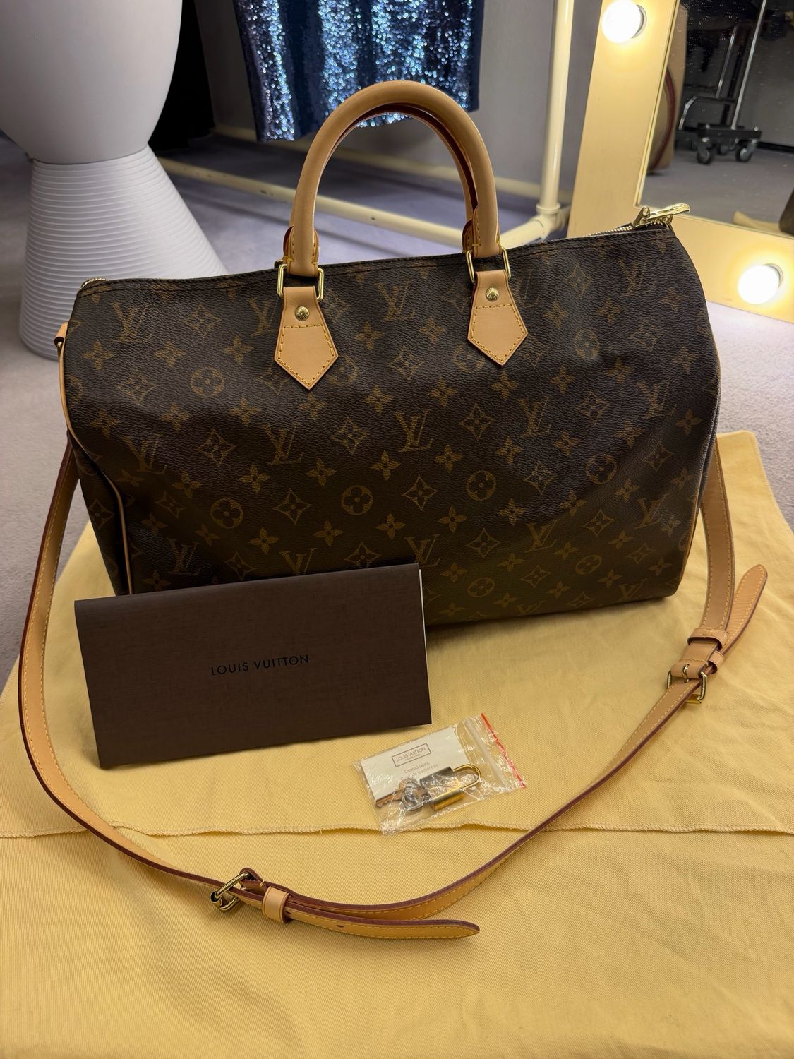 LV SPEEDY BANDOULIERE 40