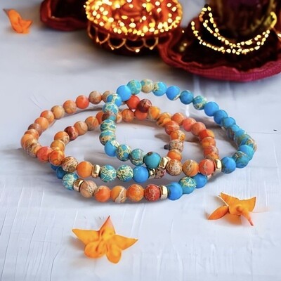 Trippelarmband i turkos och orange jasper