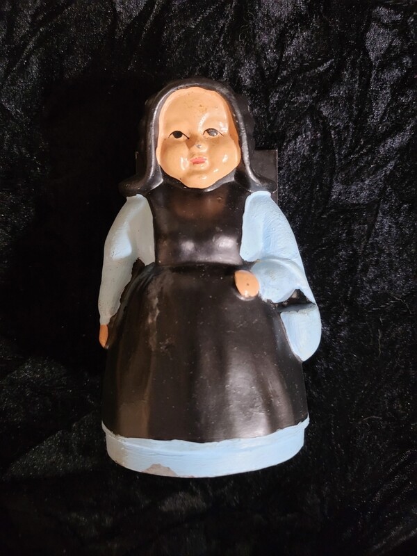 Vintage blue Amish woman bookend