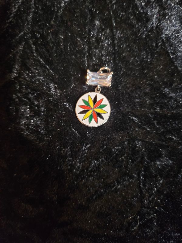 Vintage enamel 12 Point Rosette and Cubic Zirconia pendant