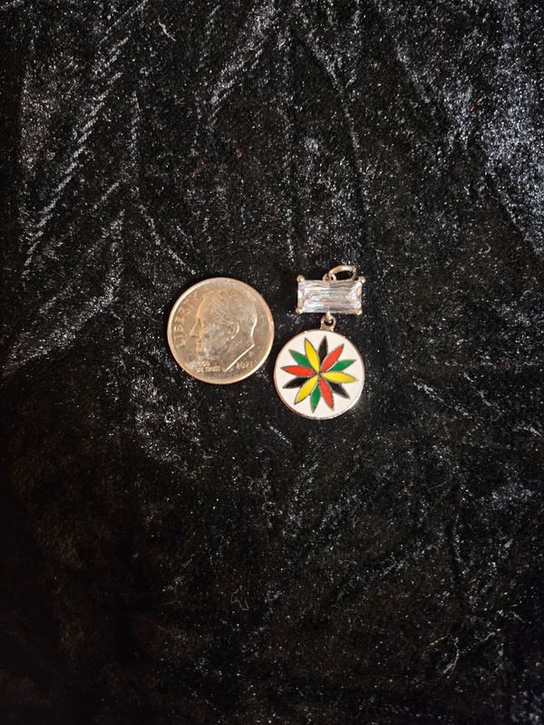 Vintage enamel 12 Point Rosette and Cubic Zirconia pendant
