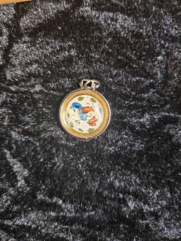 Vintage metal Distelfink pendent