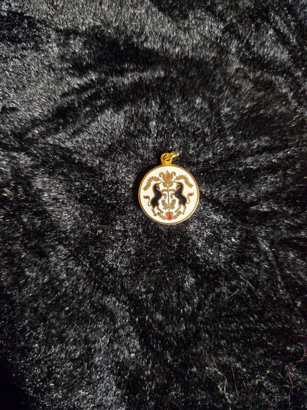 Vintage Unicorn gold color pendent