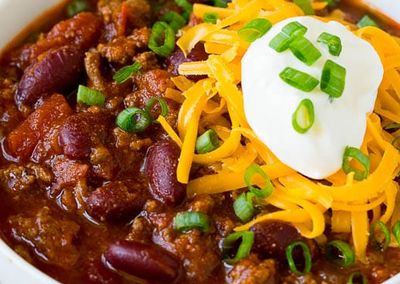 Beef Chili with cheddar shred, sour cream and green onions [1lb.]