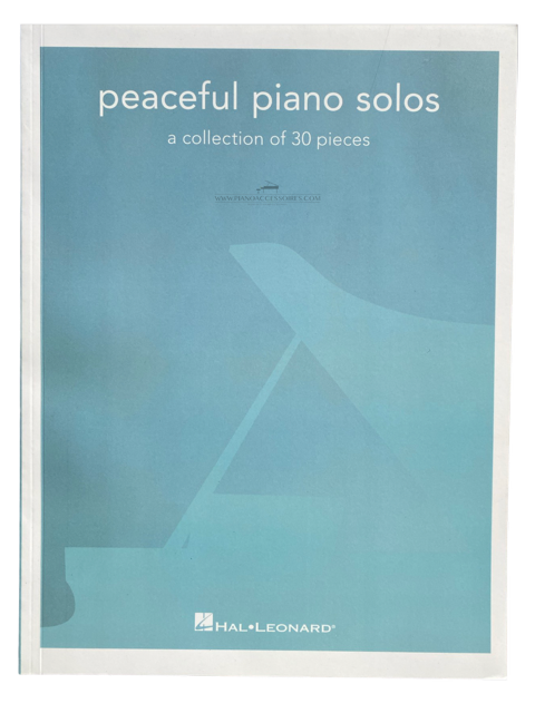 Peaceful Piano Solo Omslag van Peaceful Piano Solo met een bundel rustige pianostukken voor solo piano.
