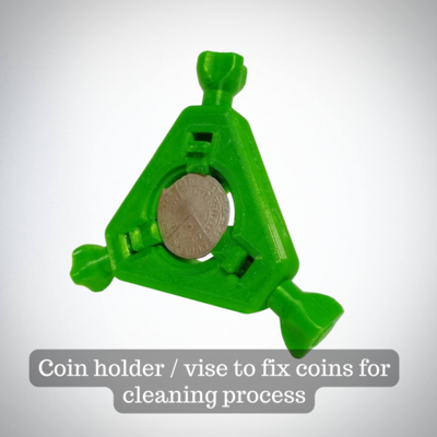 Coin holder / vise to fix coins for cleaning process