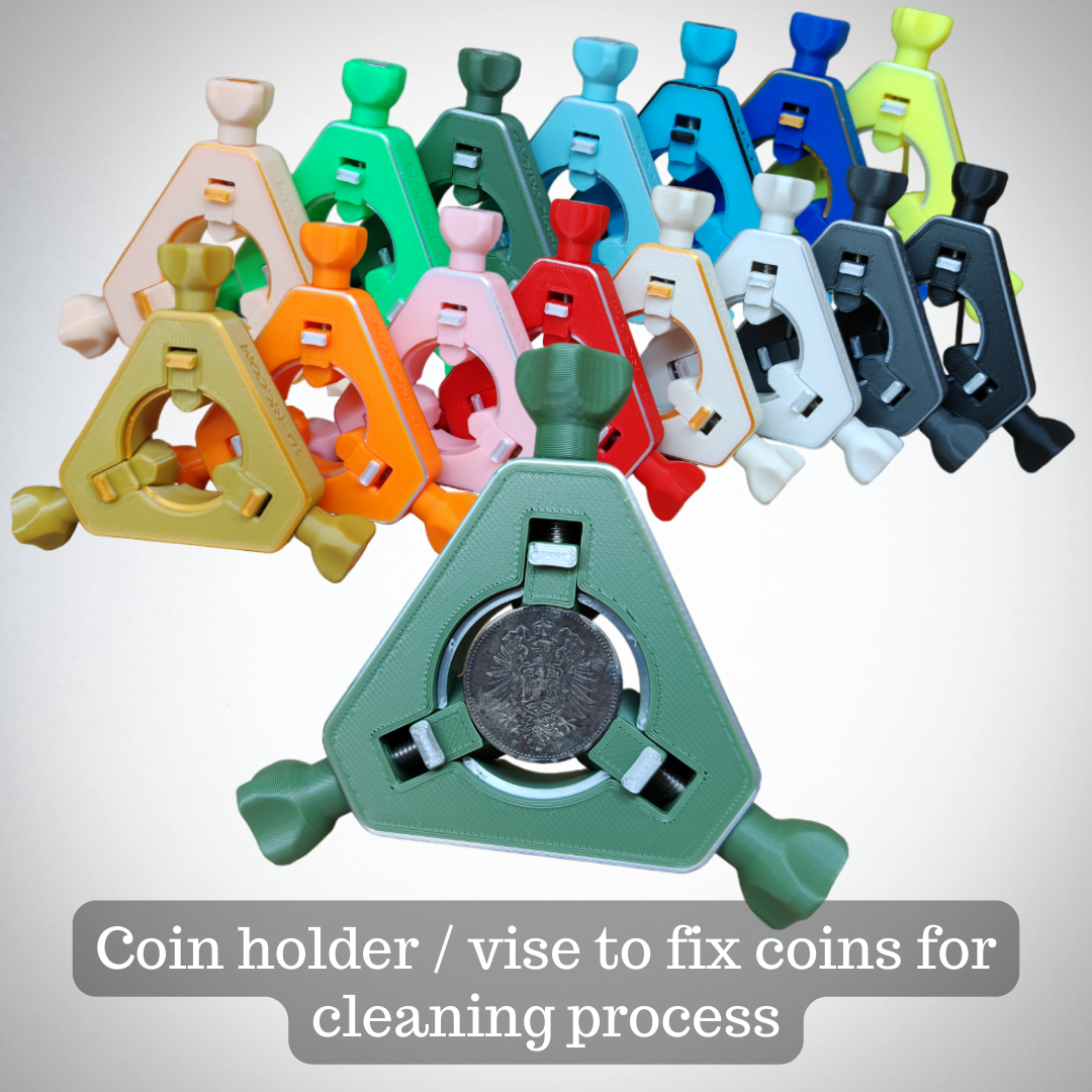 Coin holder / vise to fix coins for cleaning process
