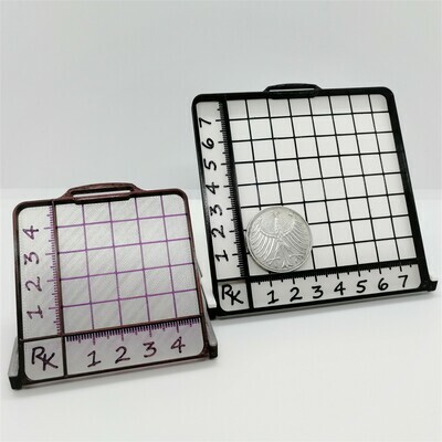 Folding measuring board for presenting the find