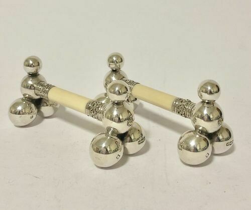 Pair of Antique Silver and Ivory Knife Rests