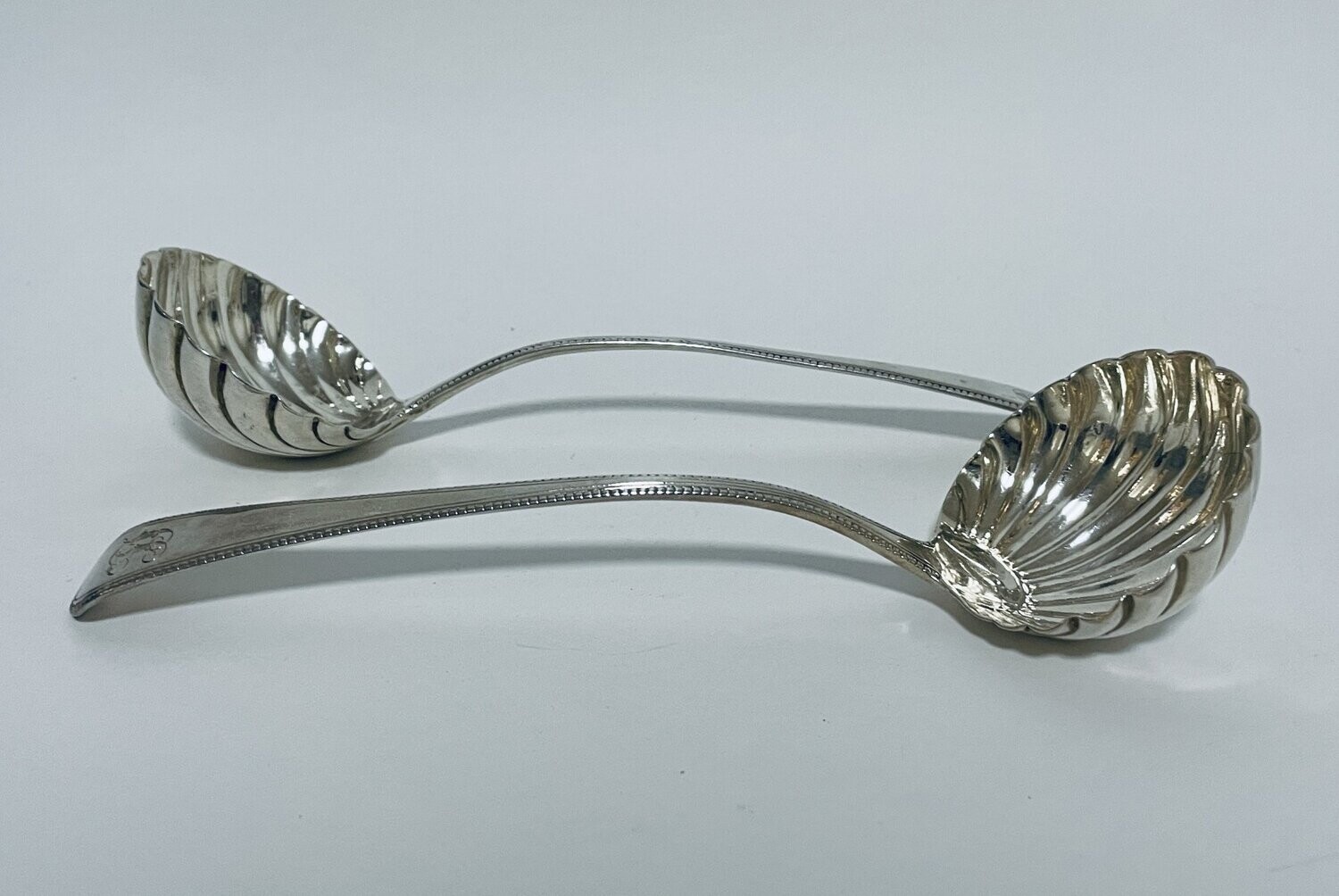 Pair of Georgian Silver Shell Shaped Ladles