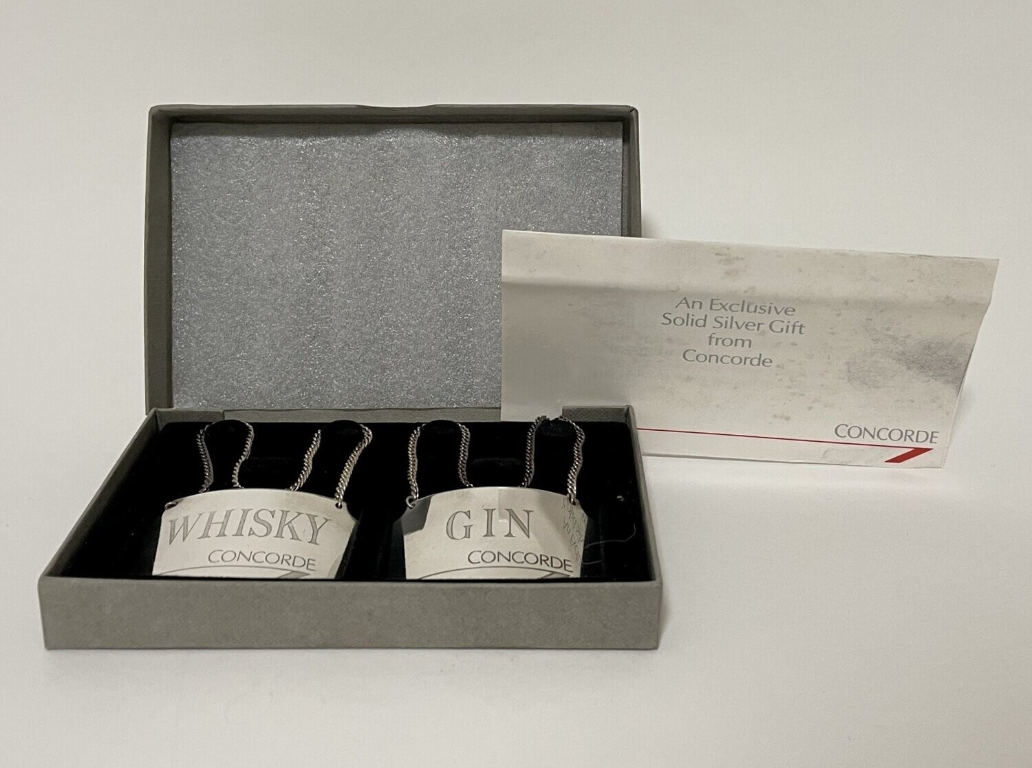 Pair of Silver Concorde Decanter Labels