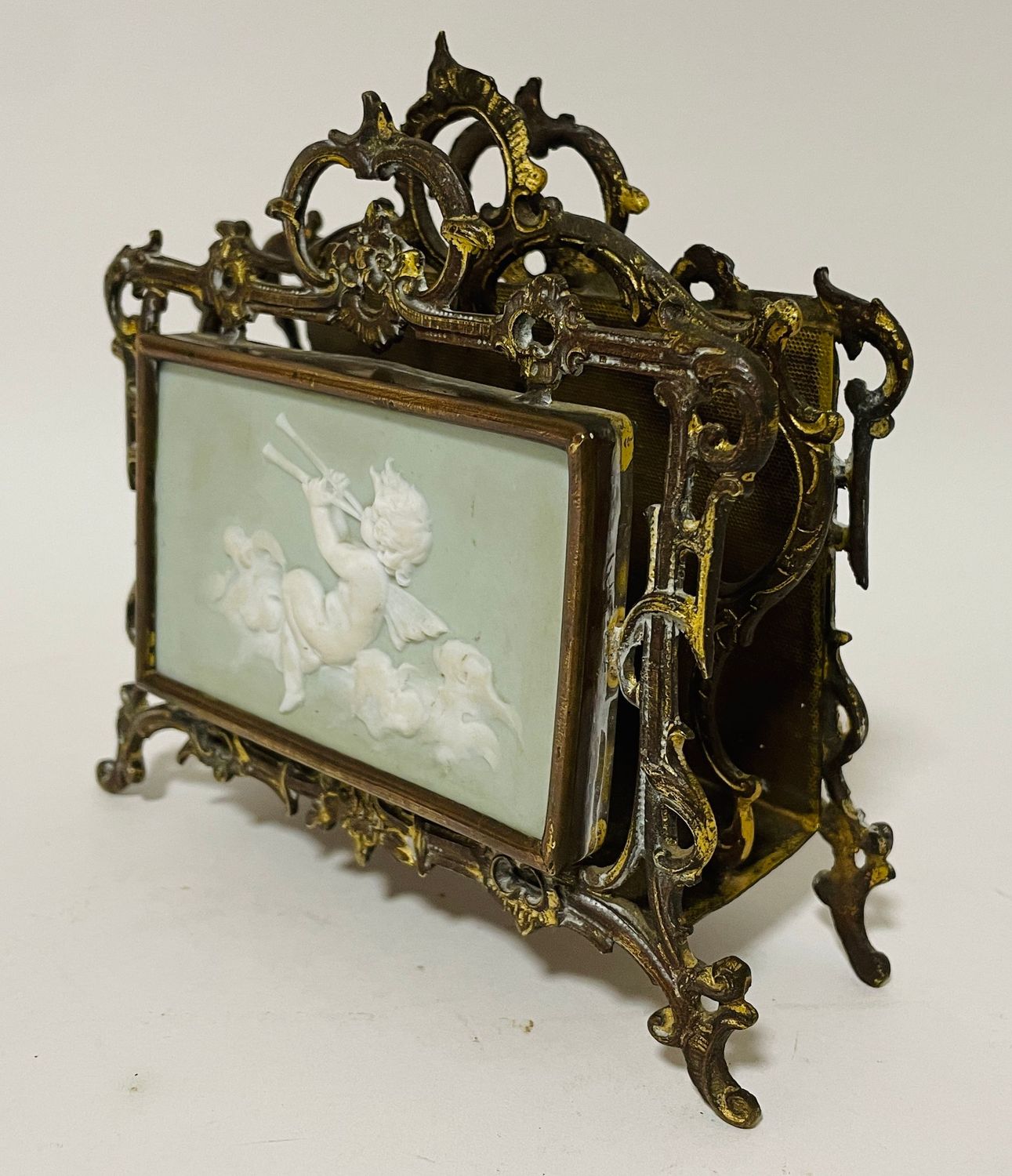 Antique Gilt Letter Rack with Porcelain Cherub Plaque