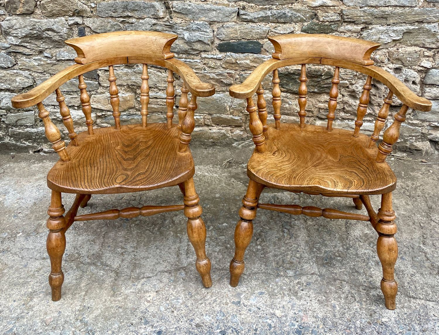 Pair of Antique Elm Captain's Chairs